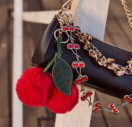 Discover women’s novelty items perfect for gifting, including chic accessories with fun, eye-catching details.